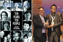 The <i>Bangkok Post Sunday</i> editor Paul Ruffini (left) and journalist Chaiyot Yongcharoenchai celebrate their award at Wednesday's WAN-IFRA Asian Media Awards 2015. (Photo by  Pattarapong Chatpattarasill)